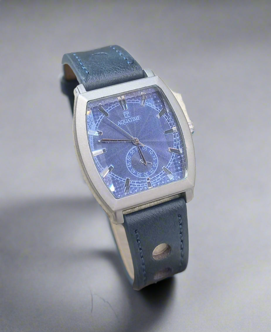 Blue watch with a detailed face in a box